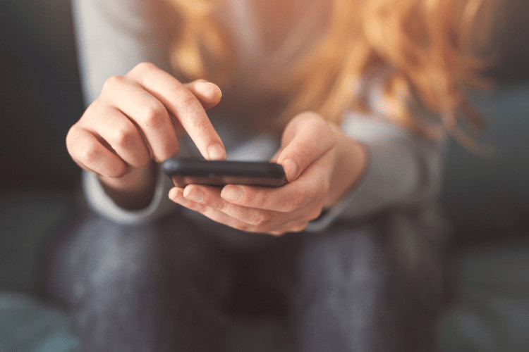 Girl looking at her phone