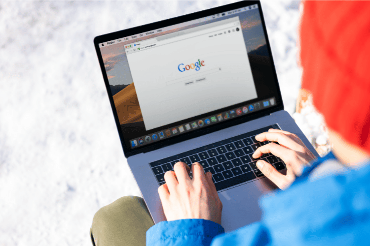 MacBook user searching Google